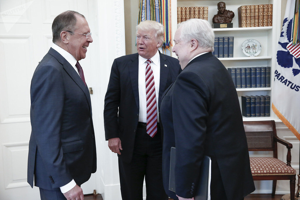 A handout photo made available by the Russian Foreign Ministry on May 10, 2017 shows US President Donald J. Trump (C) speaking with Russian Foreign Minister Sergei Lavrov (L) and Russian Ambassador to the U.S. Sergei Kislyak during a meeting at the White House in Washington, DC A handout photo made available by the Russian Foreign Ministry on May 10, 2017 shows US President Donald J. Trump (C) speaking with Russian Foreign Minister Sergei Lavrov (L) and Russian Ambassador to the U.S. Sergei Kislyak during a meeting at the White House in Washington, DC