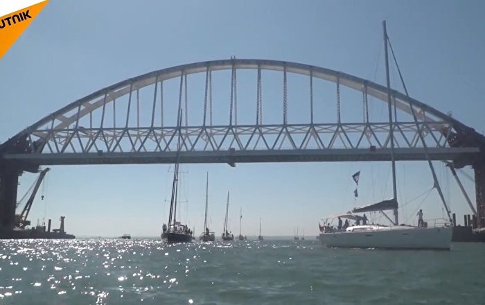 Over 20 Boats Sail Under the New Arch of Russia’s Bridge to Crimea