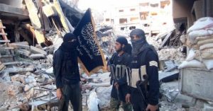 Members of the al-Nusra Front in the Yarmuck Palestinian refugee camp south of Damascus in 2014 (Rami Al-Sayed, Getty Images)